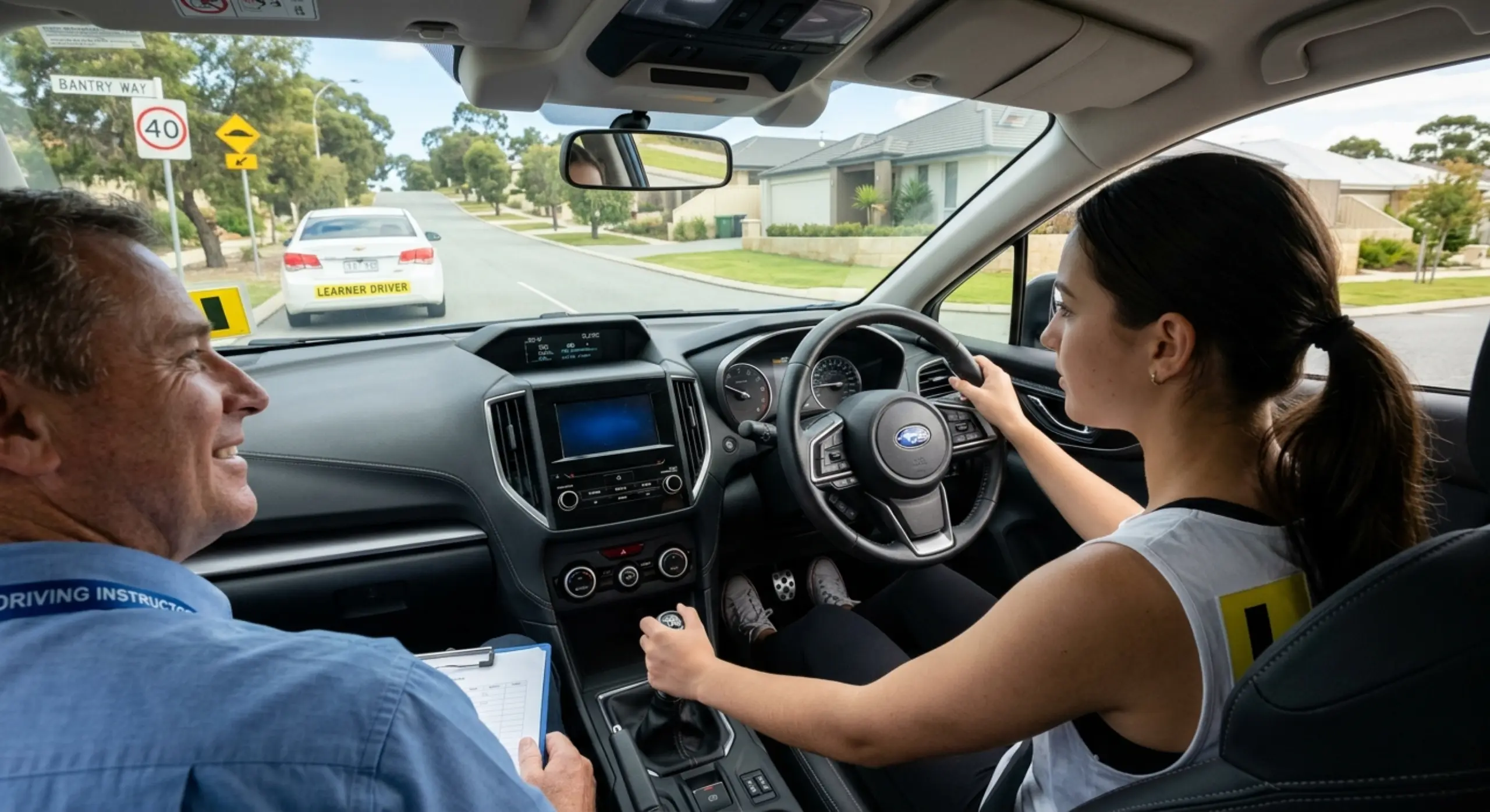 Learner driver mastering manual driving tips with instructor guidance
